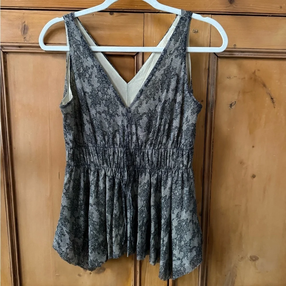 Michael Kors black and nude sleeveless blouse with an asymmetrical hem size P